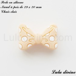 Perle en silicone Nœud à pois